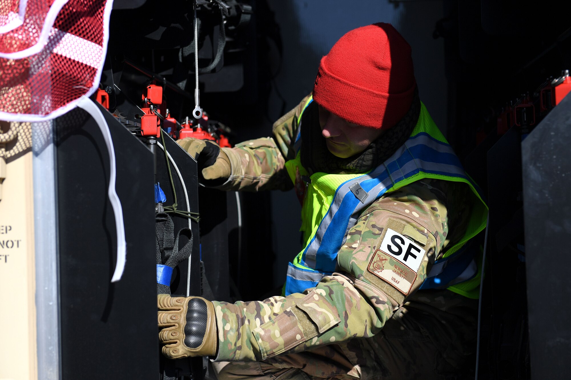 Airmen clear their weapons