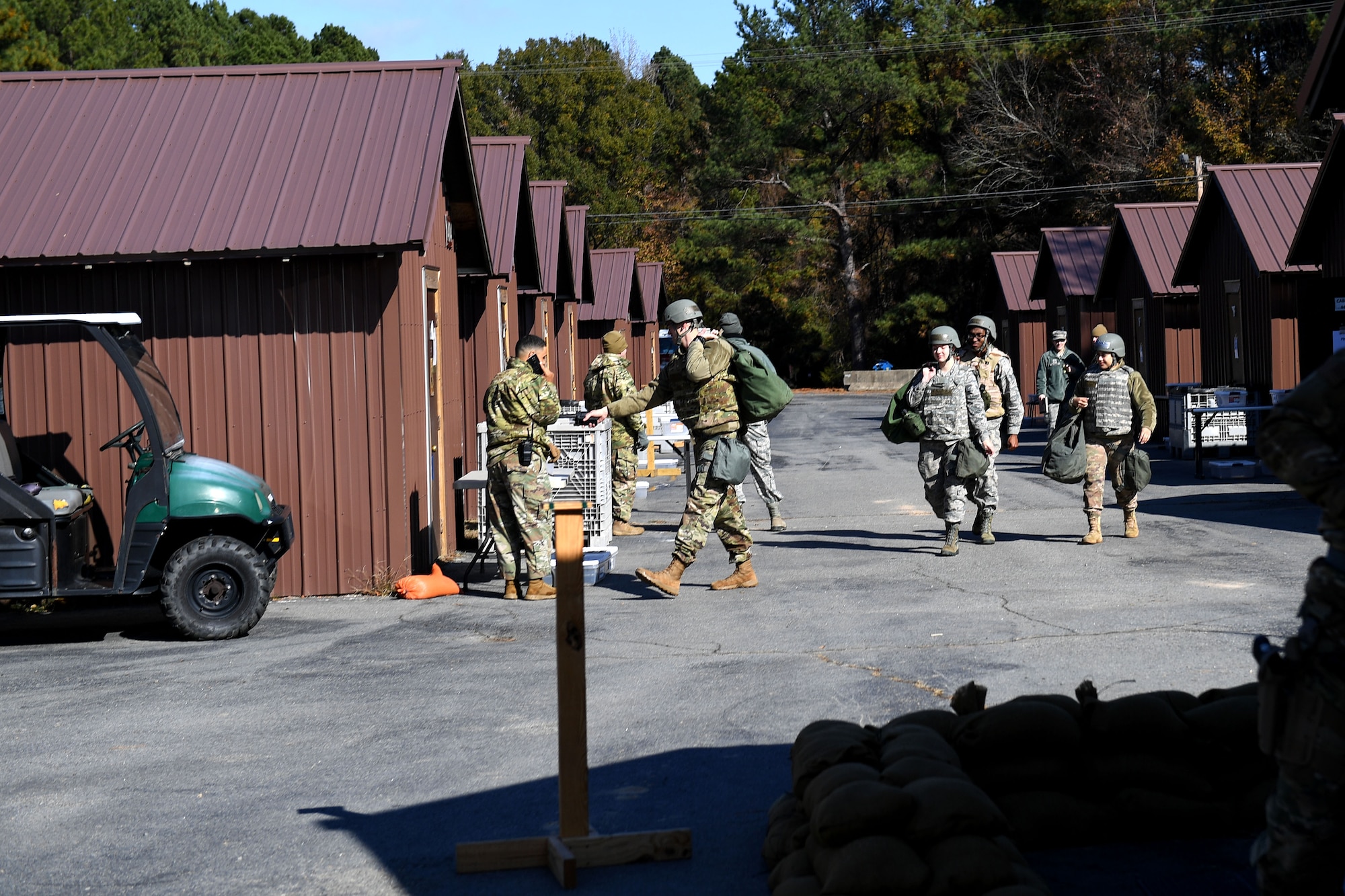 Airmen lay down sandbags
