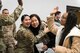Airman 1st Class Kuyeon Bates (right), 2nd Force Support Squadron unit deployment manager, embraces Senior Airman Mia Luciano (left), 2nd FSS UDM, after returning from a short-term deployment to RAF Fairford, England, Nov. 14, 2019, at Barksdale Air Force Base, La. Over 300 Airmen and four B-52H Stratofortress aircraft were deployed in support of U.S. Strategic Command's Bomber Task Force. (U.S. Air Force photo by Airman 1st Class Lillian Miller)