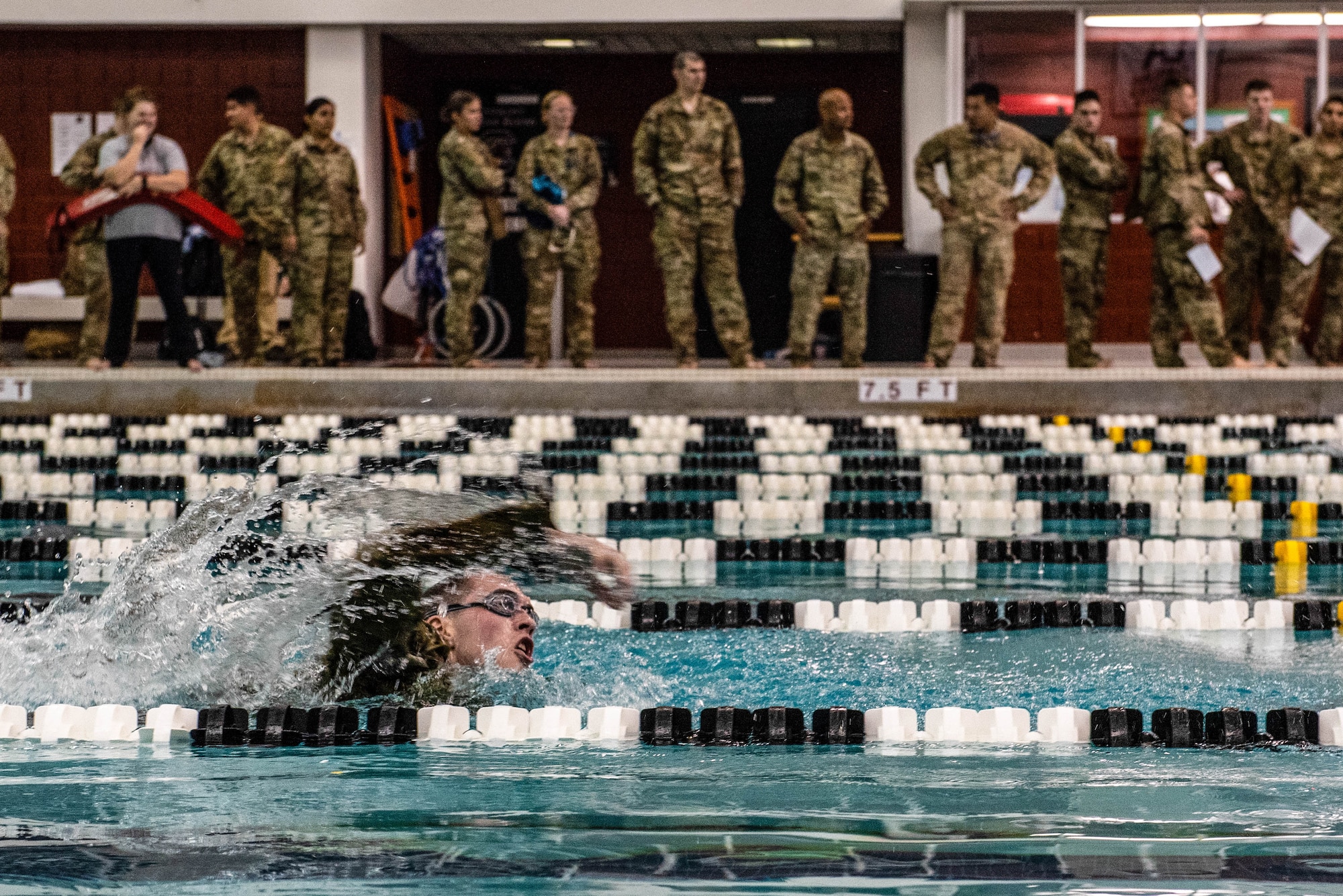 A German Armed Forces Proficiency Badge (GAFPB) competitor races to the finish line during the 100-meter swim in Columbia, South Carolina (S.C.), Nov. 8, 2019.