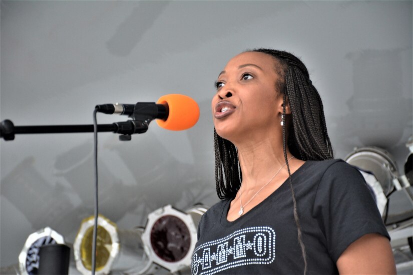 Special guest Patricia Conyers, a member of the Center for American Military Music Opportunities group, sings the National Anthem at Fort Lee’s Inaugural 2019 Suicide Awareness 5k Sept. 14, 2019. The event was hosted by the 2nd Brigade Headquarters and Headquarters Company, 94th Training Division-Force Sustainment and designed to raise suicide awareness amongst our nation's service members.