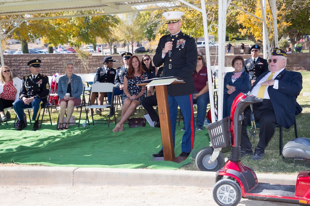 Colonel Craig C. Clemans, commanding officer, Marine Corps Logistics Base Barstow, California, delivers a Veterans Day message during the ceremony at Mountain View Memorial Park, Barstow, Nov. 11. Brigadier General David A. Lesperance, commanding general, National Training Center, Fort Irwin, Calif., also spoke to the gathered veterans, family members and those paying respect at “the eleventh hour of the eleventh day of the eleventh month.” Originally recognized as Armistice Day to mark the end of World War I, the observance was changed to Veterans Day in the aftermath of the Korean War in 1954.