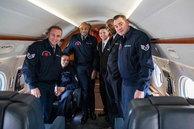 Pilots and flight attendants visit the 97th AMW.