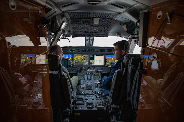 Pilots and flight attendants visit the 97th AMW.