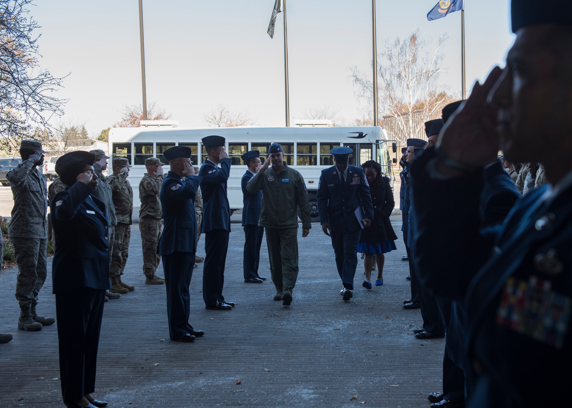 Personnel from the 366th Fighter Wing form a cordon for command chiefs set to attend the Chief Legacy ceremony, Nov. 11, 2019, at Mountain Home Air Force Base, Idaho. The ceremony honored prior 366th FW command chiefs. (U.S. Air Force photo by Senior Airman Tyrell Hall)