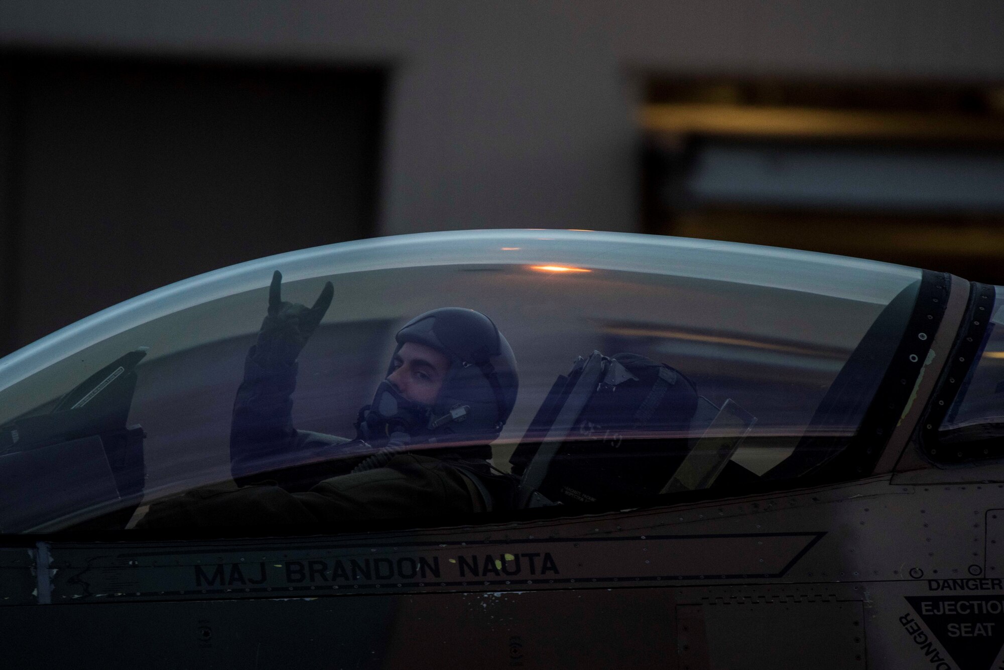 U.S. Air Force Capt. Garret Wilson, 18th Aggressor Squadron F-16 Fighting Falcon pilot, the taxis on a runway Eielson Air Force Base, Alaska, Oct. 28, 2019. Eight F-16s flew to Nellis AFB, Nevada to support of the U.S. Air Force Weapons Instructor Course. (U.S. Air Force photo by Airman 1st Class Aaron Larue Guerrisky)