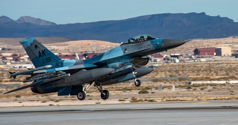 A U.S. Air Force F-16 Fighting Falcon from the 18th Aggressor Squadron takes off at Nellis Air Force Base, Nevada, Nov. 6, 2019. The 18th AGRS utilizes a mobile training team that gives them opportunities to travel to another base and prepare Combat Air Force, joint and allied aircrews on how to fight and overcome a realistic adversary. (U.S. Air Force photo by Nellis Air Force Base Public Affairs)