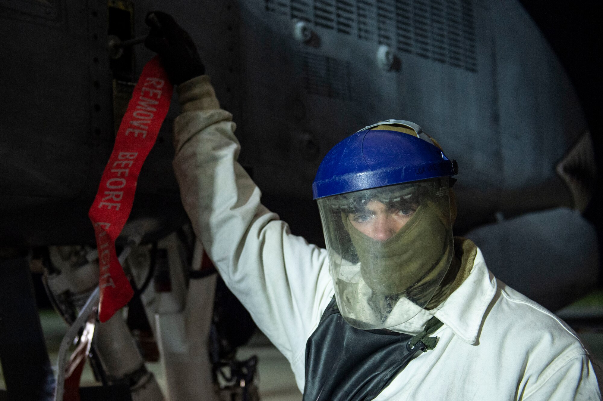 A photo of an Airman performing maintenance with liquid oxygen