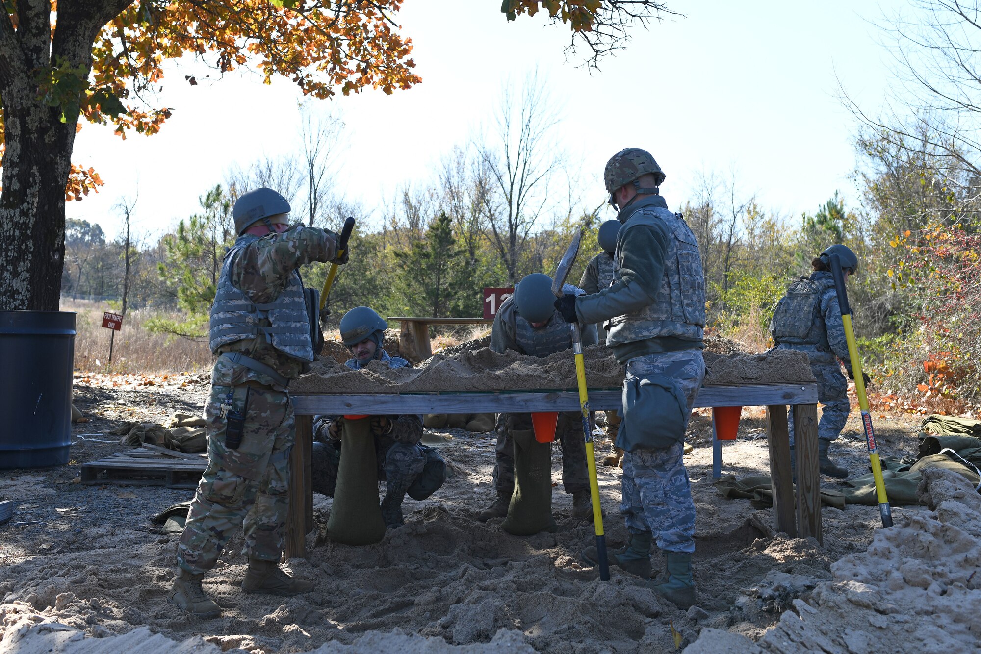 Airmen fill sandbags