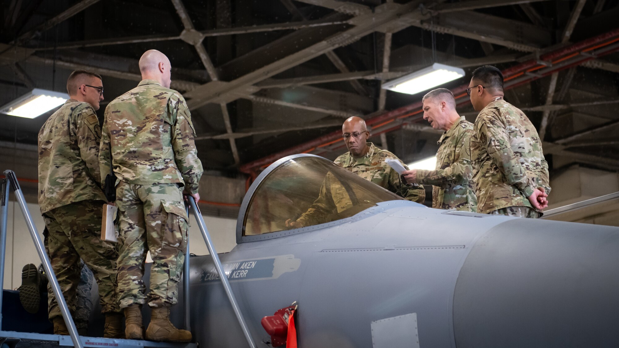 U.S. Air Force Gen. CQ Brown, Jr., Pacific Air Forces commander, inspects an F-15C Eagle during a tour at Kadena Air Base, Japan, Nov. 12, 2019. During the tour, Brown visited various base squadrons and agencies to learn about unit-specific issues, their operations, and answer questions. (U.S. Air Force photo by Staff Sgt. Benjamin Raughton)