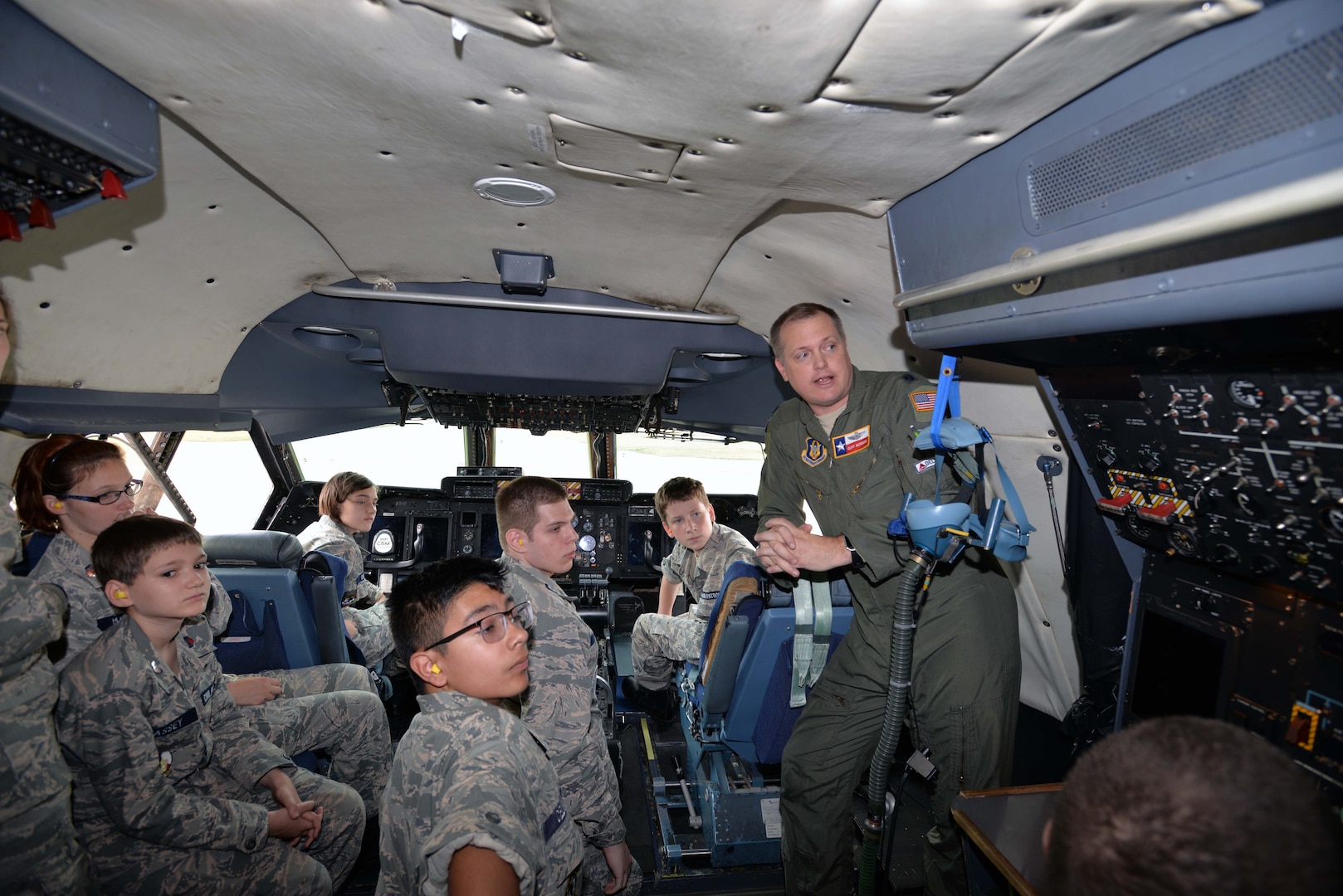 Lt. Col. Cliff Jackson, 68th Airlift Squadron pilot, describes the C-5M Super Galaxy flight engineer station to Civil Air Patrol cadets Nov. 6, 2019 at Joint Base San Antonio-Lackland, Texas (U.S. Air Force photo by Master Sgt. Kristian Carter)