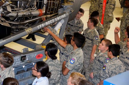 Civil Air Patrol cadets learn about the C-5M Super Galaxy’s engines in the 433rd Maintenance Squadron’s engine shop Nov. 6, 2019 at Joint Base San Antonio-Lackland, Texas (U.S. Air Force photo by Staff Sgt. Lauren M. Snyder)