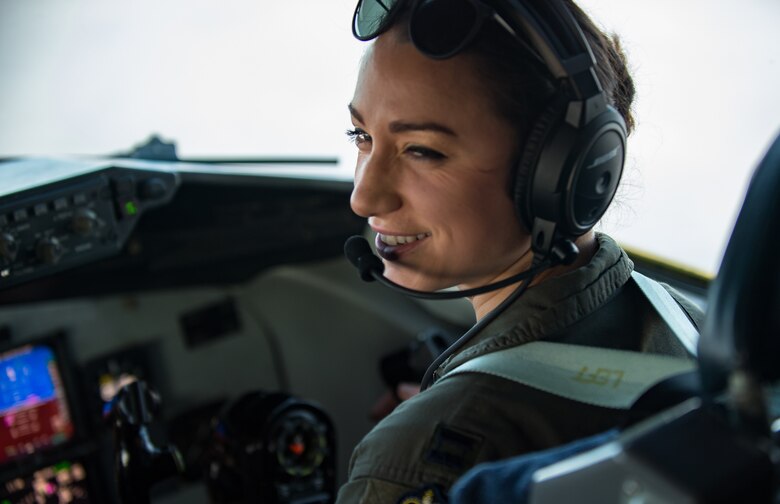 U.S. Air Force Capt. Ingersoll,100th Air Refueling Wing KC-135 Stratotanker pilot reacts to the crew communications via headset during Bomber Task Force 20-1, Nov. 6, 2019. This deployment allows aircrews and support personnel to conduct theater integration and improve bomber interoperability with joint partners and allied nations. (U.S. Air Force photo by Staff Sgt. Trevor T. McBride)