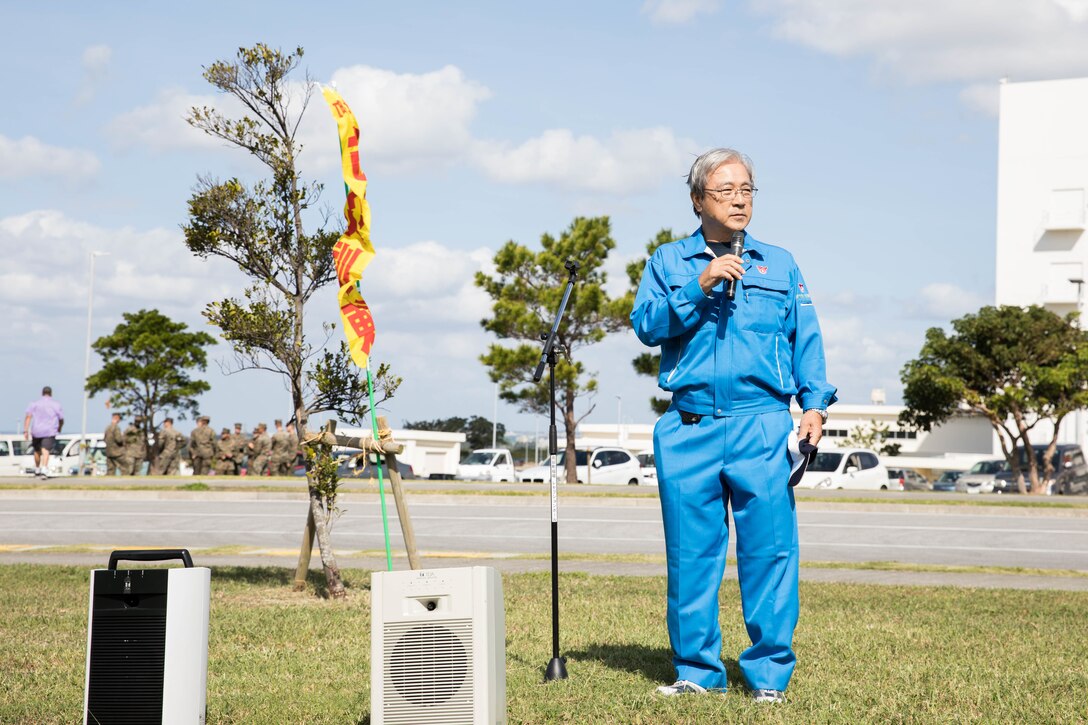 Masakatsu Kamiyama, vice mayor of Chatan Town, speaks to during a closing ceremony as part of a Tsunami Evacuation Drill, Camp Foster, Okinawa, Japan, Nov. 9, 2019. The drill was held to convey the readiness and capabilities of the camp to members of the U.S. and local communities in the event of an emergency.