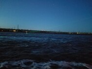 Photo of laser shining at dawn