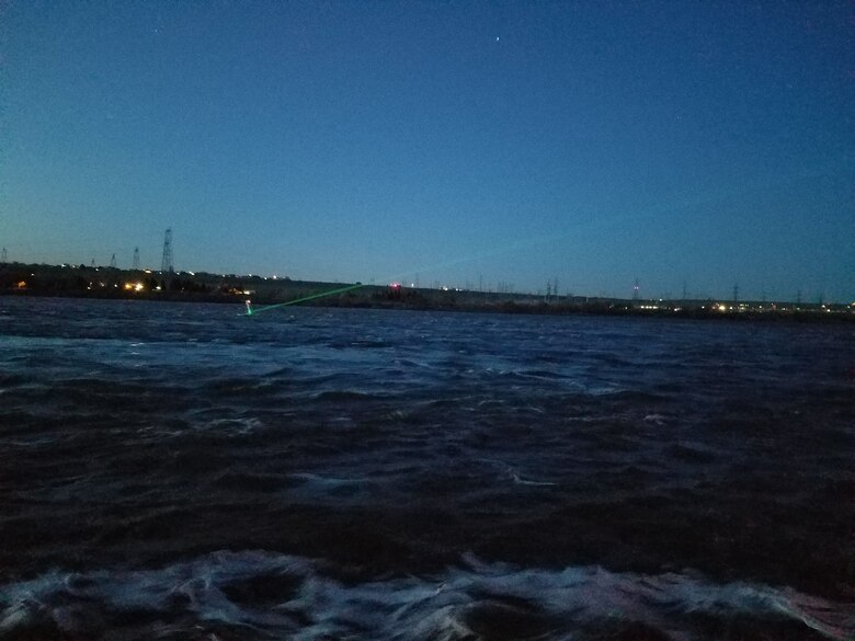 Photo of laser shining at dawn