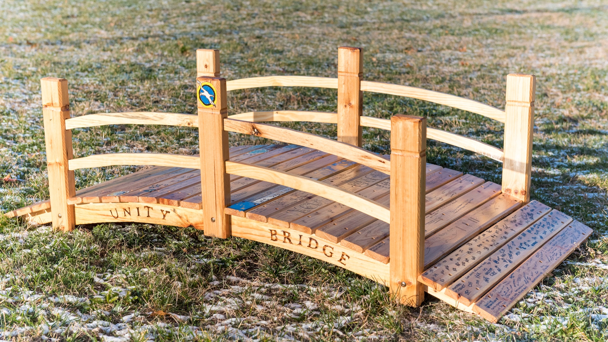 Unity Bridge on lightly snow covered grass