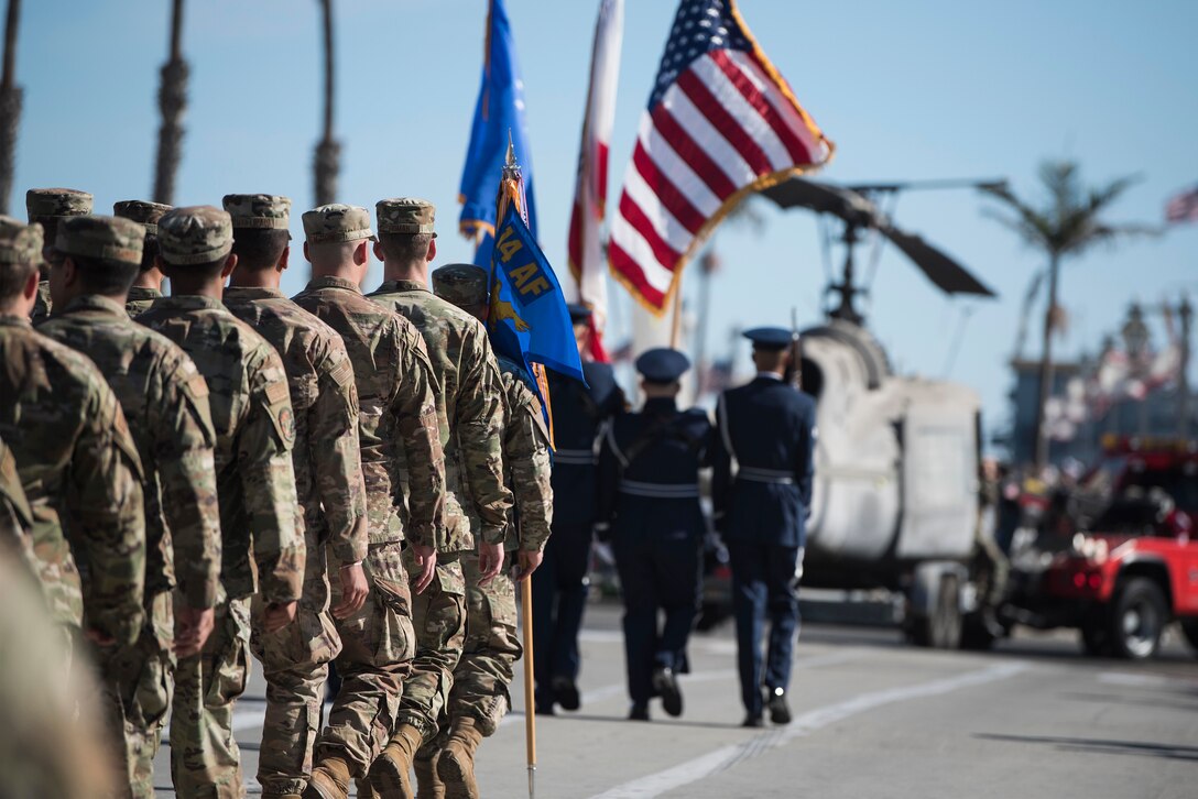 Service members from Vandenberg Air Force Base march during the Santa Barbara Veterans Day Parade Nov. 9, 2019, in Santa Barbara Calif. Approximately 116 Airmen from Vandenberg marched in the parade as well as four military working horses, two military working dogs and ten vehicles. (U.S. Air Force photo by Airman 1st Class Hanah Abercrombie)