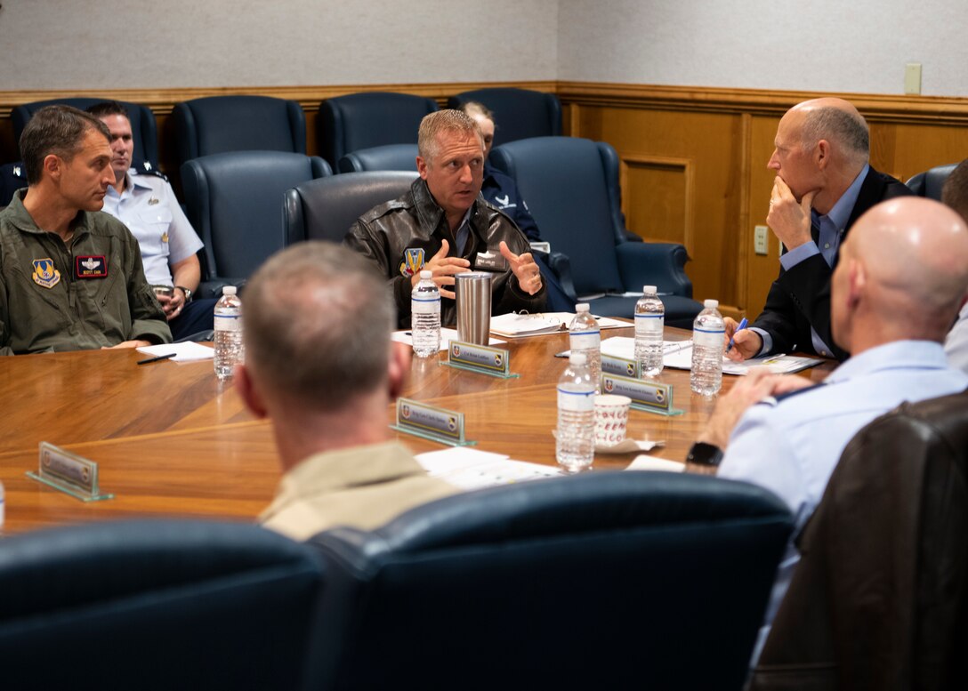 Florida Sen. Rick Scott speaks with U.S. Air Force Col. Brian Laidlaw, 325th Fighter Wing commander, and other local military leaders at Tyndall Air Force Base, Florida, Nov. 15, 2019. Scott opened up discussions for challenges and accomplishments the base is facing along with what the base still needs. (U.S. Air Force photo by Senior Airman Cheyenne Larkin)