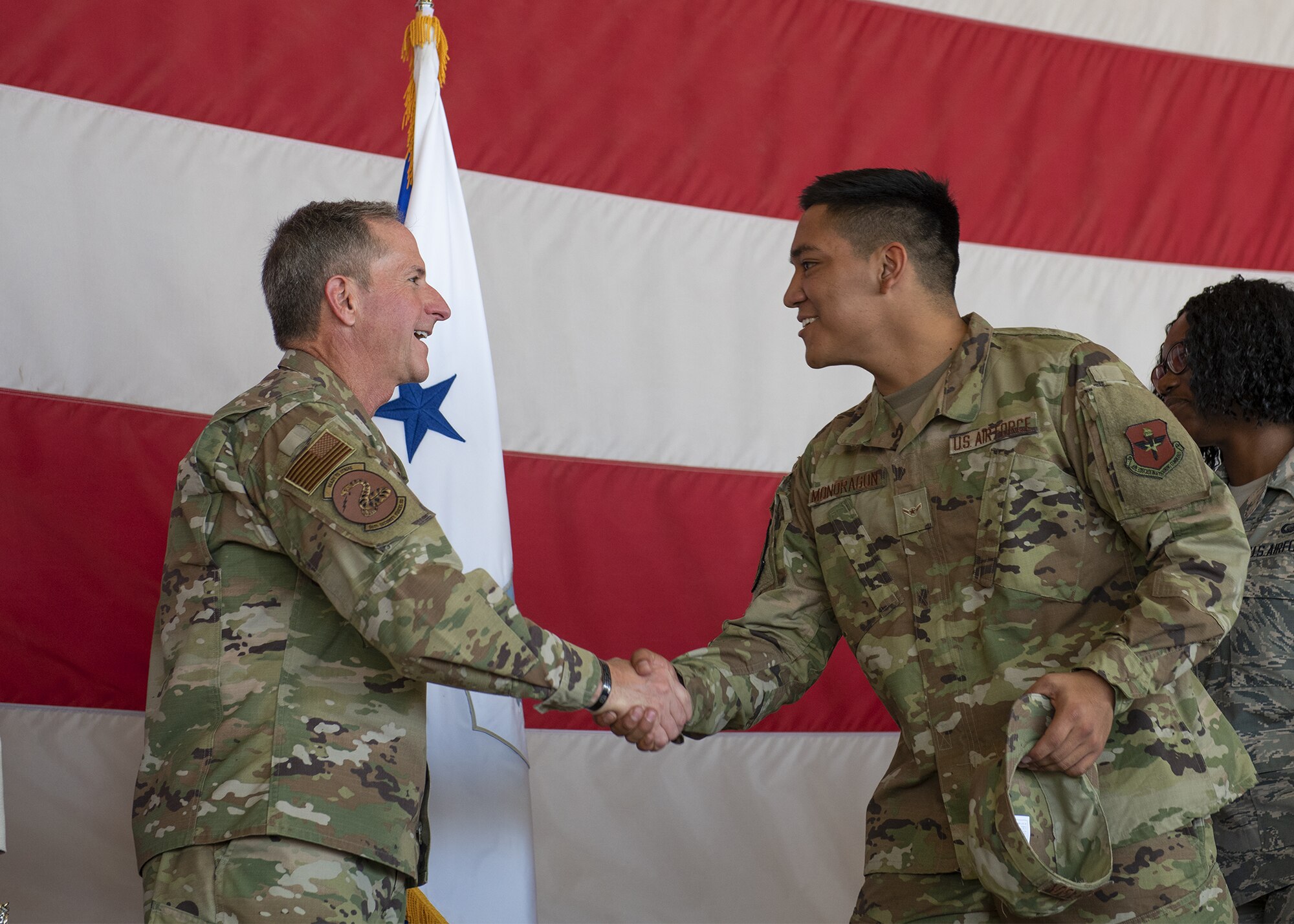 Air Force Chief of Staff Gen. David L. Goldfein greets with an Airman from the 56th Fighter Wing following an all call Nov. 8, 2019, at Luke Air Force Base, Ariz.