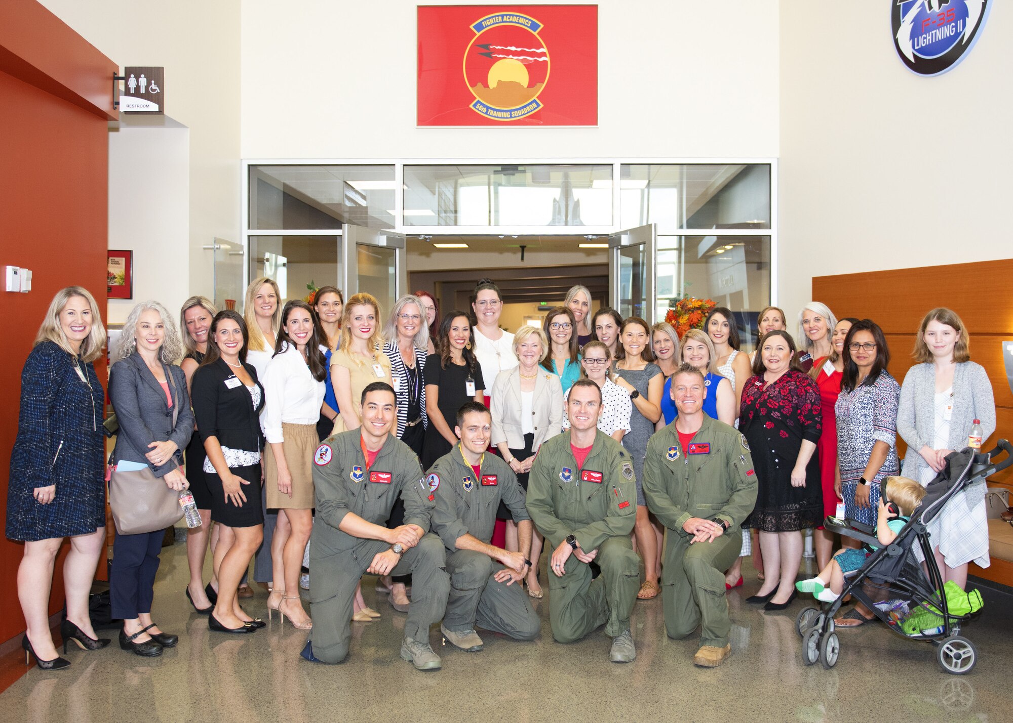 Dawn Goldfein, wife of Air Force Chief of Staff Gen. David L. Goldfein, poses with Luke Air Force Base key spouses and 56th Training Squadron instructor pilots Nov. 8, 2019, at Luke Air Force Base, Ariz.