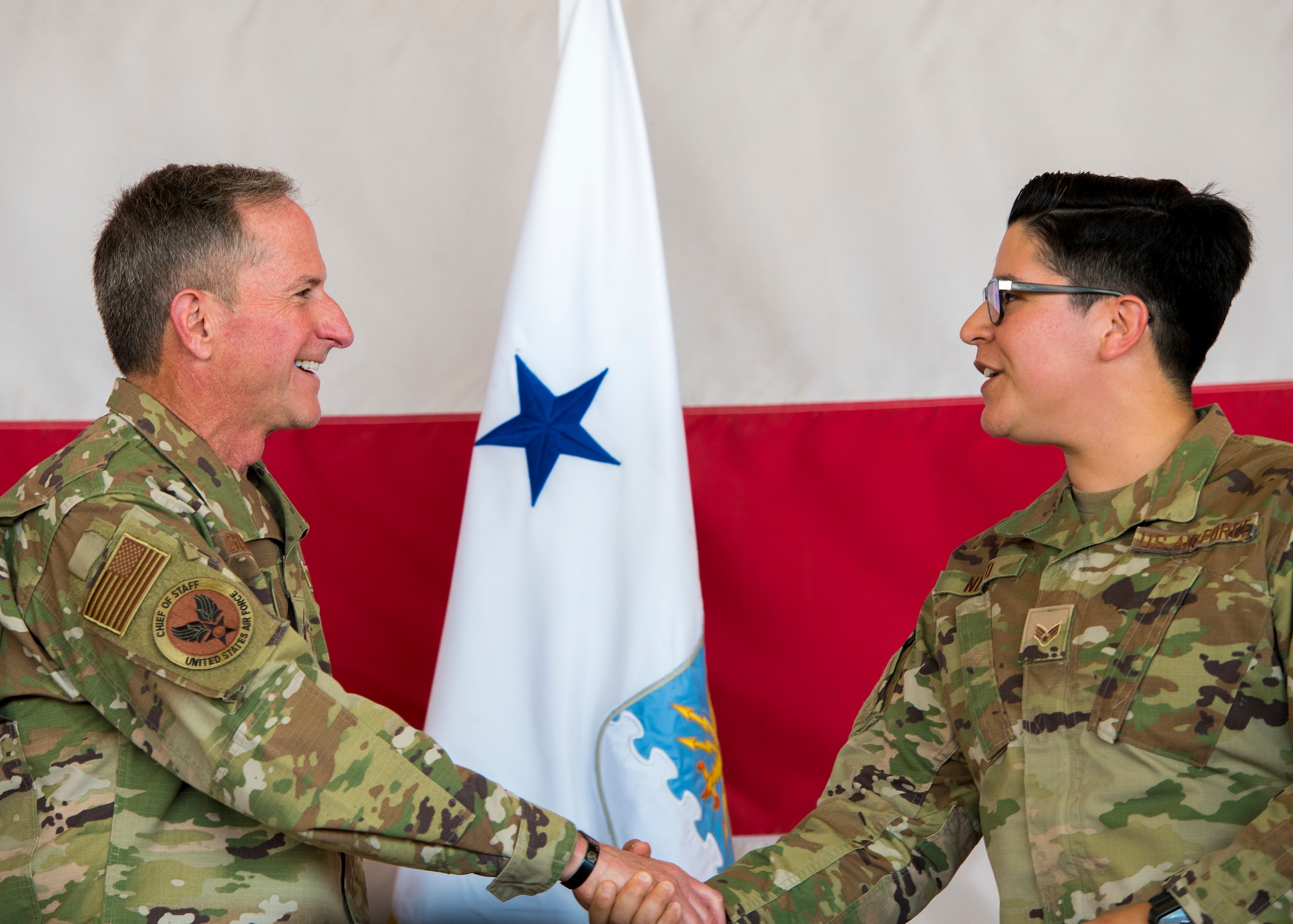 Air Force Chief of Staff Gen. David L. Goldfein greets an Airman from the 56th Fighter Wing following the Airman all call Nov. 8, 2019, at Luke Air Force Base, Ariz.