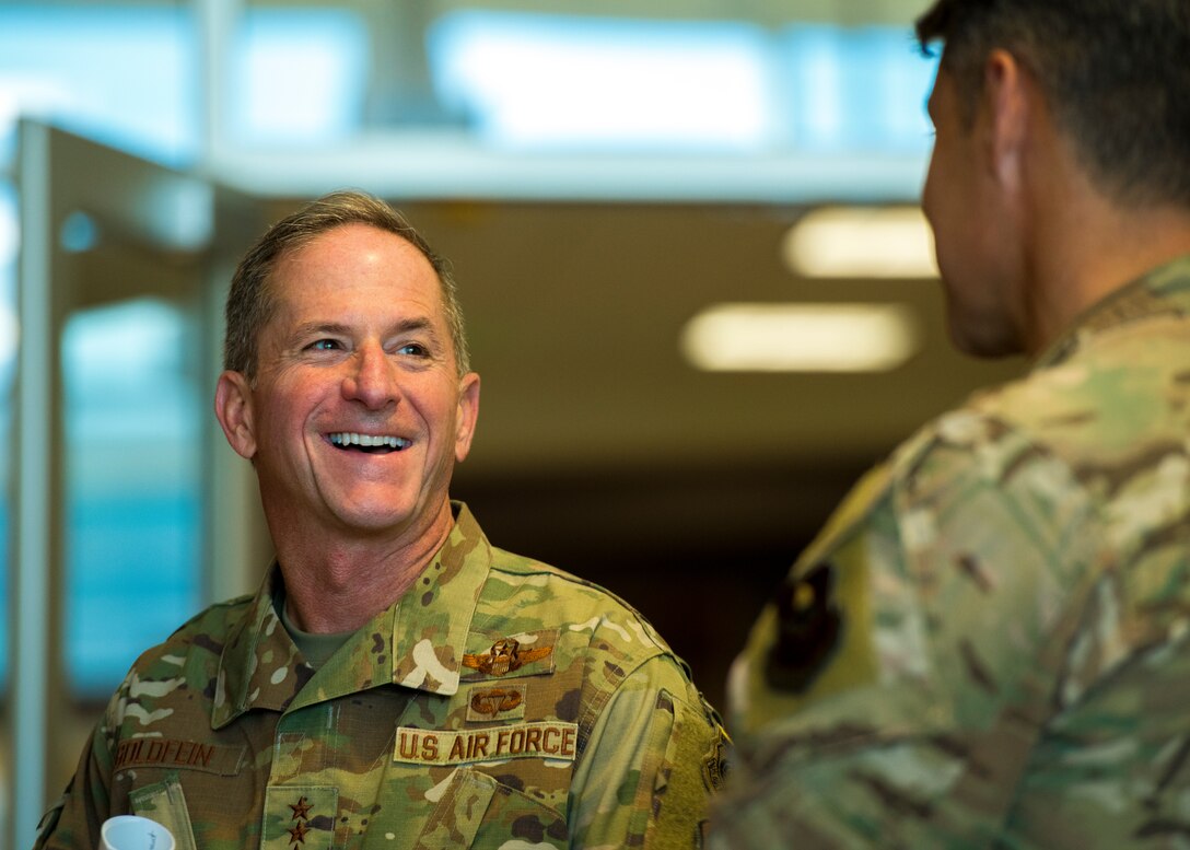 Air Force Chief of Staff Gen. David L. Goldfein speaks with Chief Master Sgt. Ronald Thompson, 56th Fighter Wing command chief, during the tour of the F-35 Academic Training Center Nov. 8, 2019, at Luke Air Force Base, Ariz.