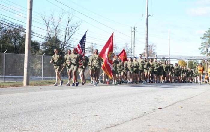 Marines and Sailors with The Chemical Biological Incident Response Force (CBIRF), participate in a battalion run aboard Naval Support Facility Indian Head, Md., on November 1st, 2019. In celebration of the 244th birthday of the Marine Corps, CBIRF collectively ran 244 miles as a unit. (U.S. Marine Corps photo by Lance Cpl. Blakely Graham/Released)