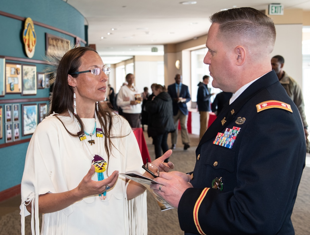 Dr. Yvette Running Horse Collin, co-founder of Sacred Way Sanctuary and the keynote speaker during the National American Indian Heritage Month observance at Redstone Arsenal, Alabama, Nov. 13, 2019, talks with Lt. Col. H. W. Hugh Darville, deputy commander of the U.S. Army Engineering and Support Center, Huntsville, after the event. The observance was organized by Huntsville Center’s Equal Employment Opportunity office in coordination with Team Redstone and the U.S. Army Aviation and Missile Command. Sacred Way Sanctuary is an education and research facility in Florence, Alabama, dedicated to preserving the Native American horse and other animals sacred to indigenous peoples of the Americas.