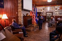 Retired U.S. Air Force Senior Master Sgt. Adrienne Smith delivers a speech during her retirement ceremony at the U.S. Army Transportation Museum. Smith retired after nearly 34 years of service in the U.S. Air Force Reserves. (DOD photo by Mass Communication Specialist 3rd Class Michael Redd/RELEASED)