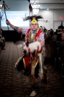Joshua McMinn of Red Road Awareness, performs a traditional men's dance during the Fort Knox National American Indian Heritage Month Observance at Saber and Quill on Fort Knox, Ky. on Nov. 15, 2019.