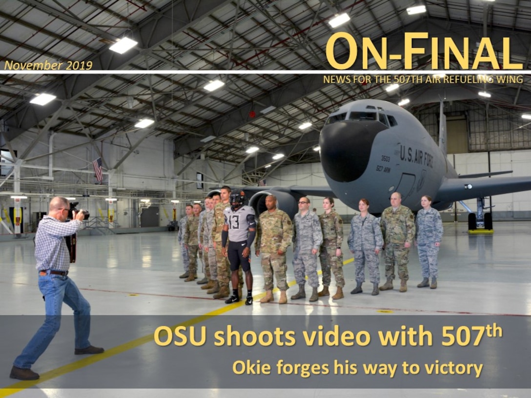 An Oklahoma State University video crew visits the 507th Air Refueling Wing and takes footage of their military appreciation uniform with and in a KC-135R Stratotanker Oct. 9, 2019, at Tinker Air Force Base, Oklahoma. (U.S. Air Force image by Tech. Sgt. Samantha Mathison)