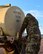An Airmen assigned to the 355th Wing fills a hydration backpack with water during Exercise Bushwhacker 19-08 at Libby Army Airfield, Arizona, Nov. 5, 2019. Bushwhacker 19-08 is enabling the wing to lead the Air Force in dynamic force employment, which is now critical for mission success. Airmen went through a simulated deployment for seven days in support of the Dynamic Wing concept. (U.S. Air Force photo by Airman 1st Class Jacob T. Stephens)