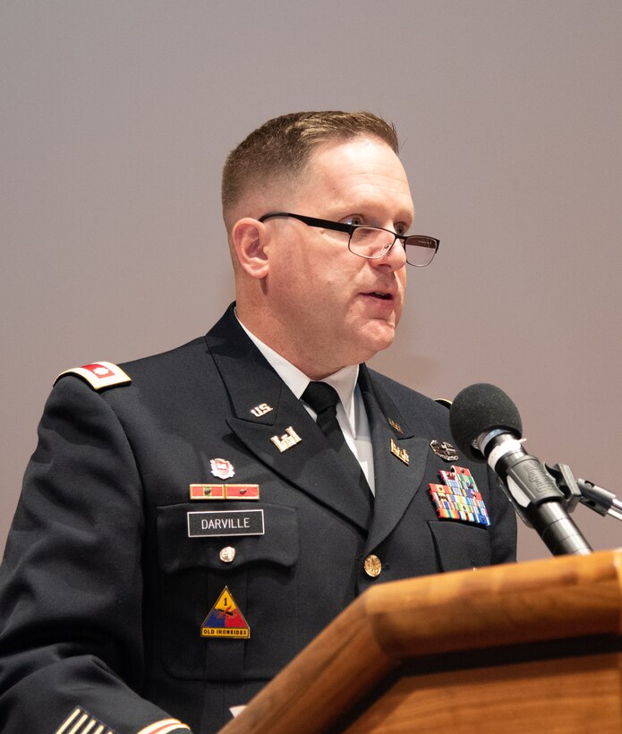 Lt. Col. H. W. Hugh Darville, deputy commander of Huntsville Center, introduces keynote speaker Dr. Yvette Running Horse Collin during the National American Indian Heritage Month observance at Redstone Arsenal, Alabama, Nov. 13, 2019. The observance was organized by Huntsville Center’s Equal Employment Opportunity office in coordination with Team Redstone and the U.S. Army Aviation and Missile Command. Sacred Way Sanctuary is an education and research facility in Florence, Alabama, dedicated to preserving the Native American horse and other animals sacred to indigenous peoples of the Americas.