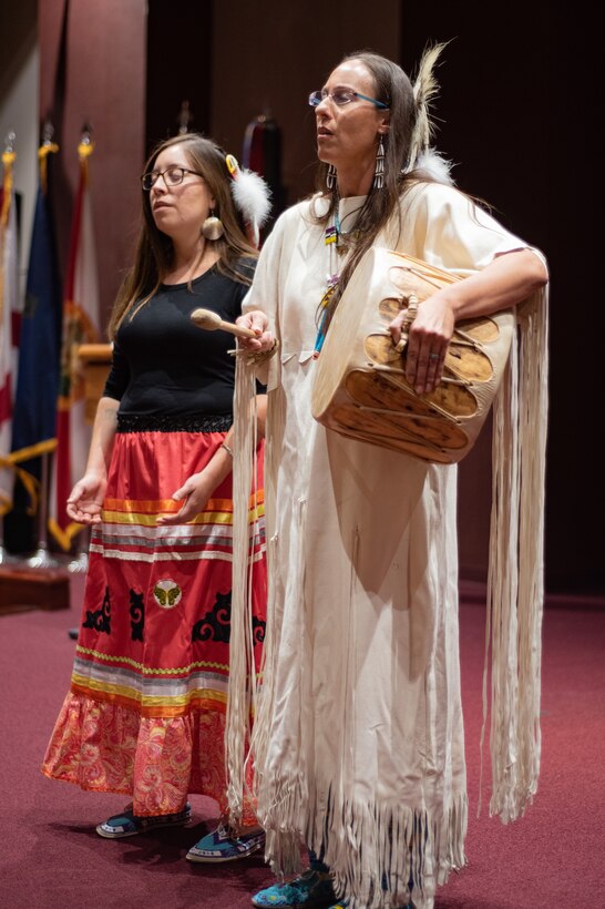 Dr. Yvette Running Horse Collin, right, and Jacquelyn Córdova, guests from Sacred Way Sanctuary in Florence, Alabama, share music with attendees of Huntsville Center’s National American Indian Heritage Month observance at Redstone Arsenal, Alabama, Nov. 13, 2019. Sacred Way Sanctuary is an education and research facility dedicated to preserving the Native American horse and other animals sacred to indigenous peoples of the Americas.