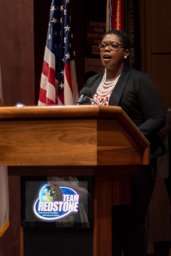 Lillian Fox, a supervising contracting officer with the U.S. Army Engineering and Support Center, Huntsville, sings “The Star-Spangled Banner” during Huntsville Center’s National American Indian Heritage Month observance at Redstone Arsenal, Alabama, Nov. 13, 2019.