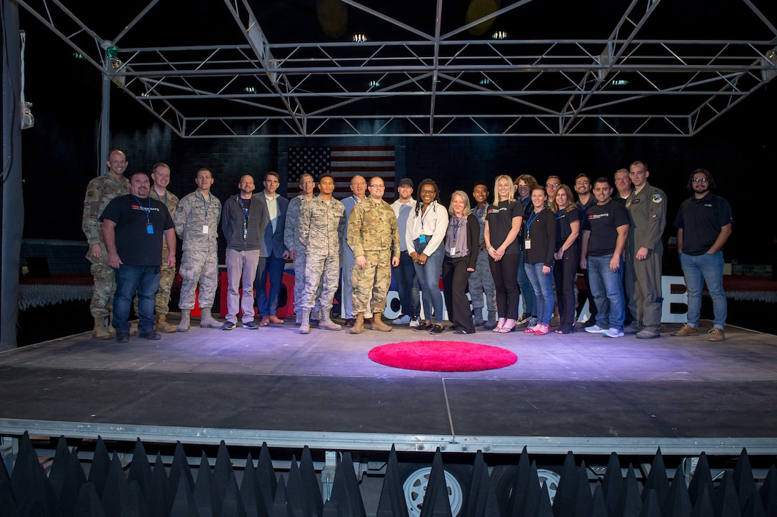 The Edwards AFB TEDx team pose for a group photo at the Benefield Anechoic Facility on Edwards Air Force Base, California, Nov. 12. (Air Force photo by Richard Gonzales)
