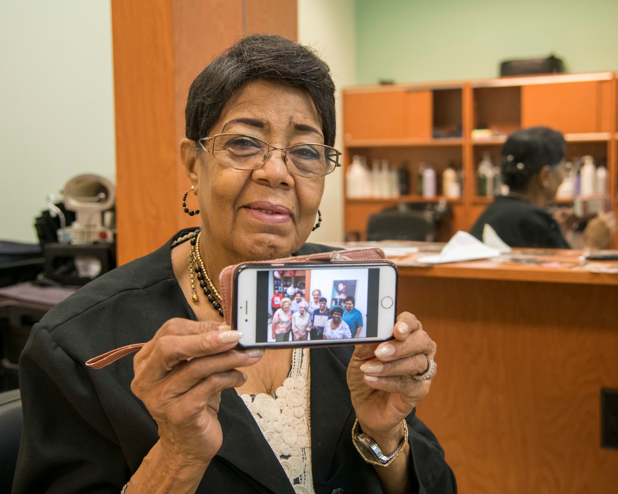 Lucy Richardson started working in the Randolph Air Force Base beauty salon 50 years ago and overcame prejudices of the time.