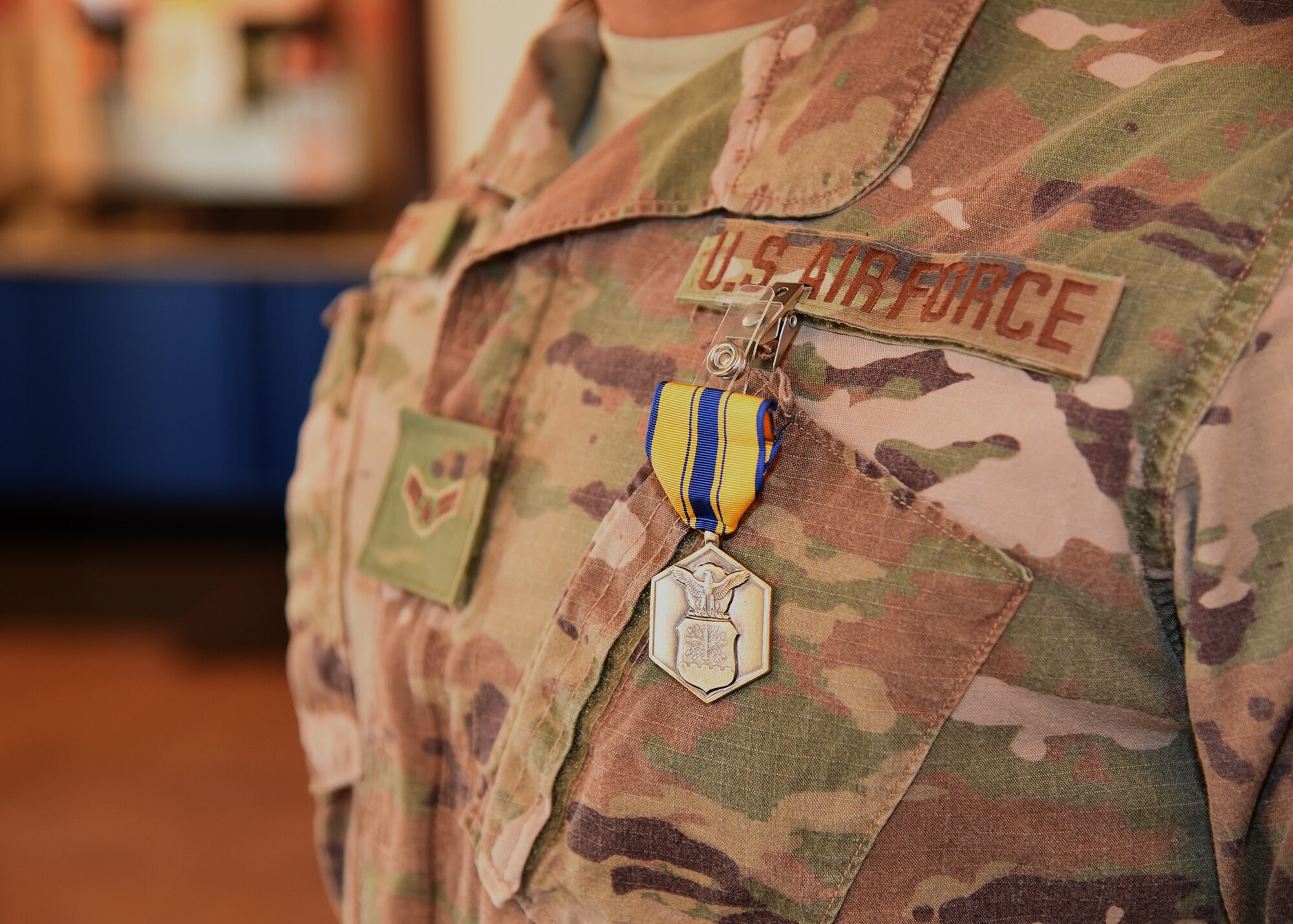 Airman 1st Class Christian Reid, 790th MSFS Defender, displays his recently earned Air Force Commendation Award l during a ceremony Nov. 15, 2019, at the Base Theater on F. E. Warren Air Force Base, Wyo. Horton received the commendation for actions taken in rescuing a family in danger of a house fire Nov. 7 in Dix, Nebraska. Reid was recognized alongside his teammate, Airman 1st Class Christopher Horton. (Air Force photo by Glenn S. Robertson)