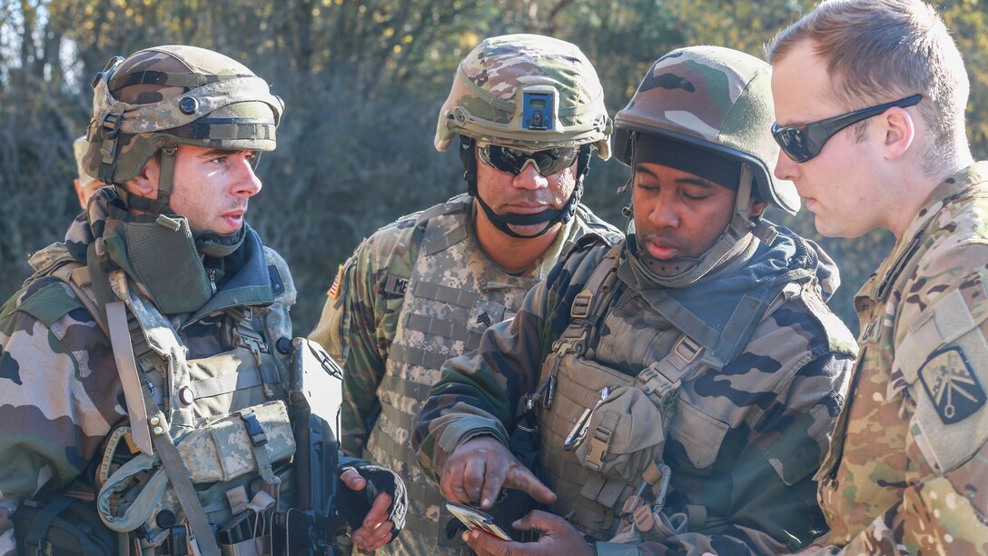 U.S. and French Troops overcome challenges together....More►
