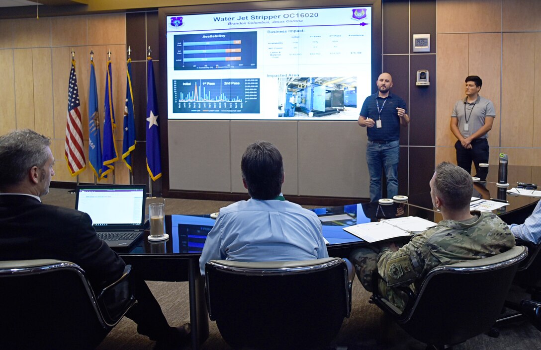 An image of a briefing from the 76th Maintenance Support Group, explaining the impact of a water jet stripper and how it contributes to cost effective readiness