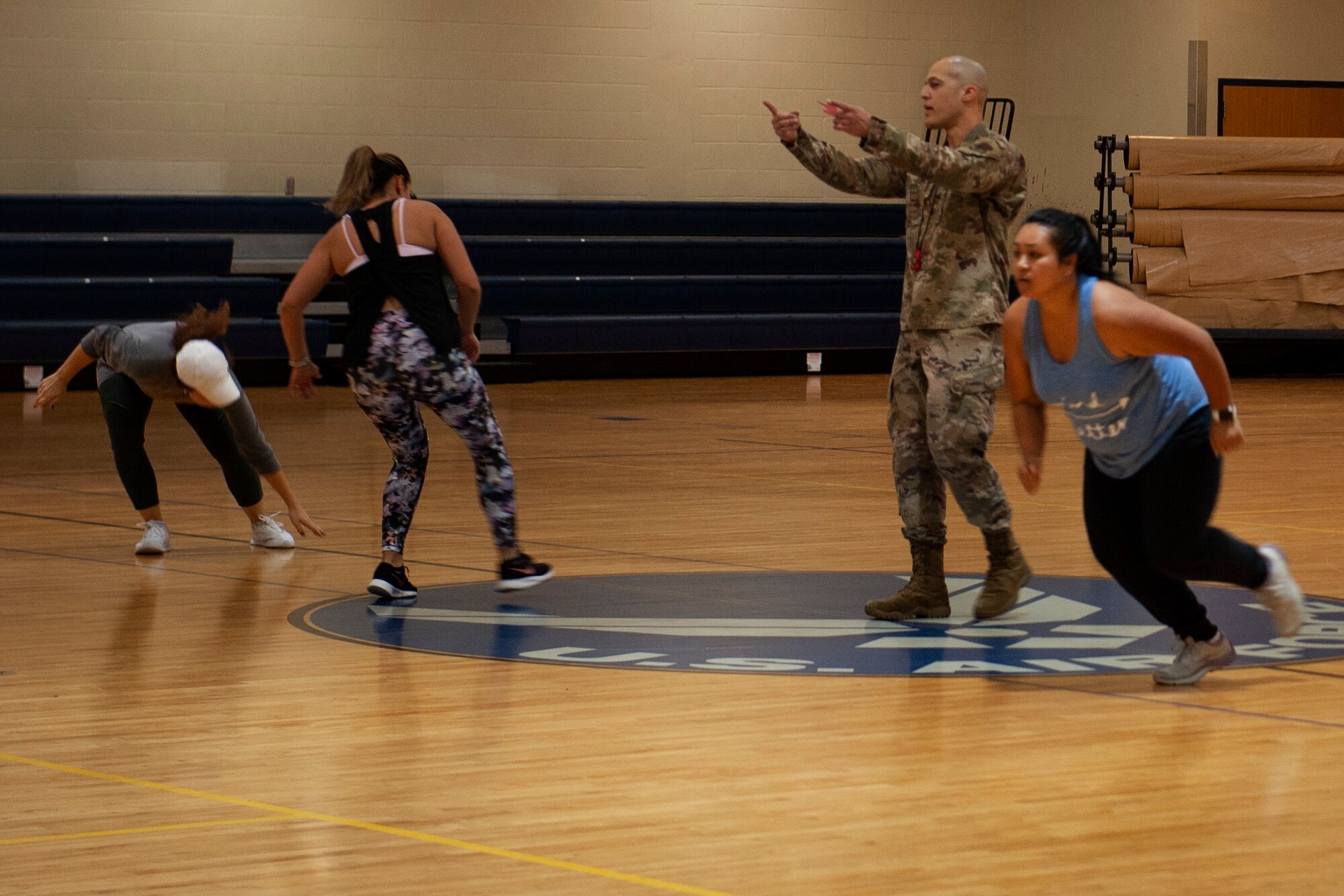 A photo of participants performing line drills during Family Boot Camp