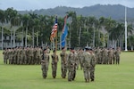 The 205th Military Intelligence Battalion, prepares to execute the passing of the Battalion colors from Lt. Col. Wayne E. Prince, outgoing commander, to Lt. Col. Scott H. Starr, incoming commander, during a change of command ceremony at historic Palm Circle on Fort Shafter, Hawaii, June 27. Through the new Army Talent Alignment Process, the Battalion Commander Assessment Program, or BCAP, will change the way officers are selected for command positions moving forward.