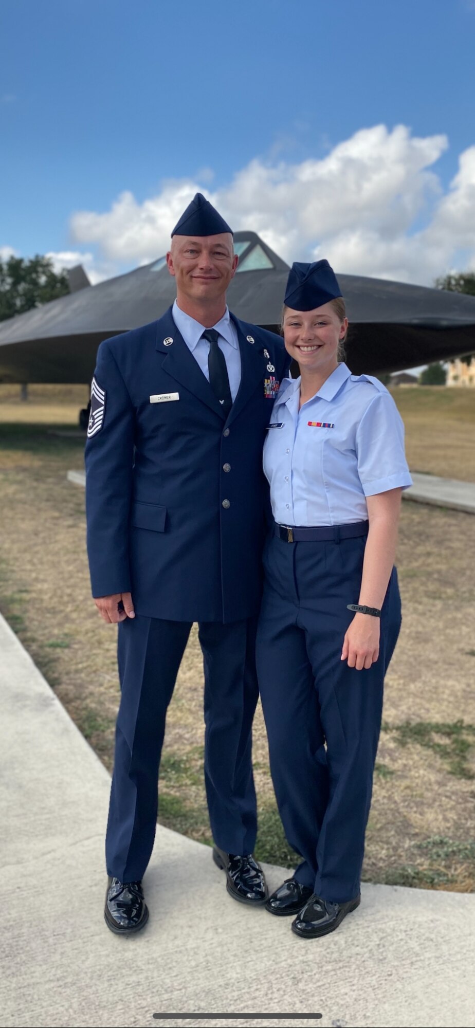 Chief Cromer and his daughter Amn Cromer at Air Force basic training graduation.