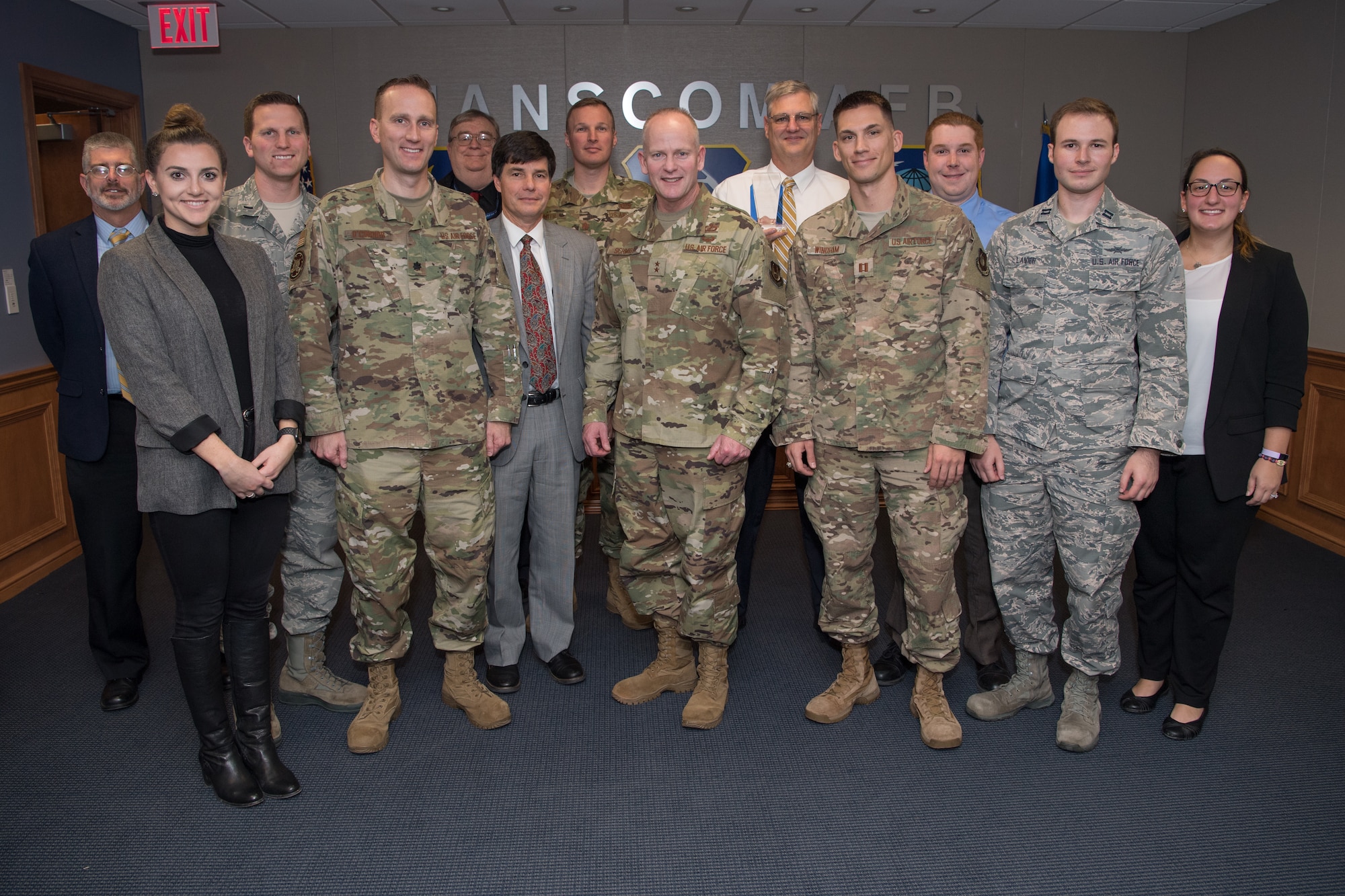 Maj. Gen. Michael Schmidt, program executive officer for Command, Control, Communications, Intelligence and Networks, poses for a picture with his directorate’s winners and nominees of the Air Force Life Cycle Management Center’s 2019 Acquisition Management Award’s after the ceremony, Hanscom Air Force Base, Mass., Nov. 14. All of Hanscom’s winners and nominees had won their categories at the local level before competing against their colleagues at this final level.