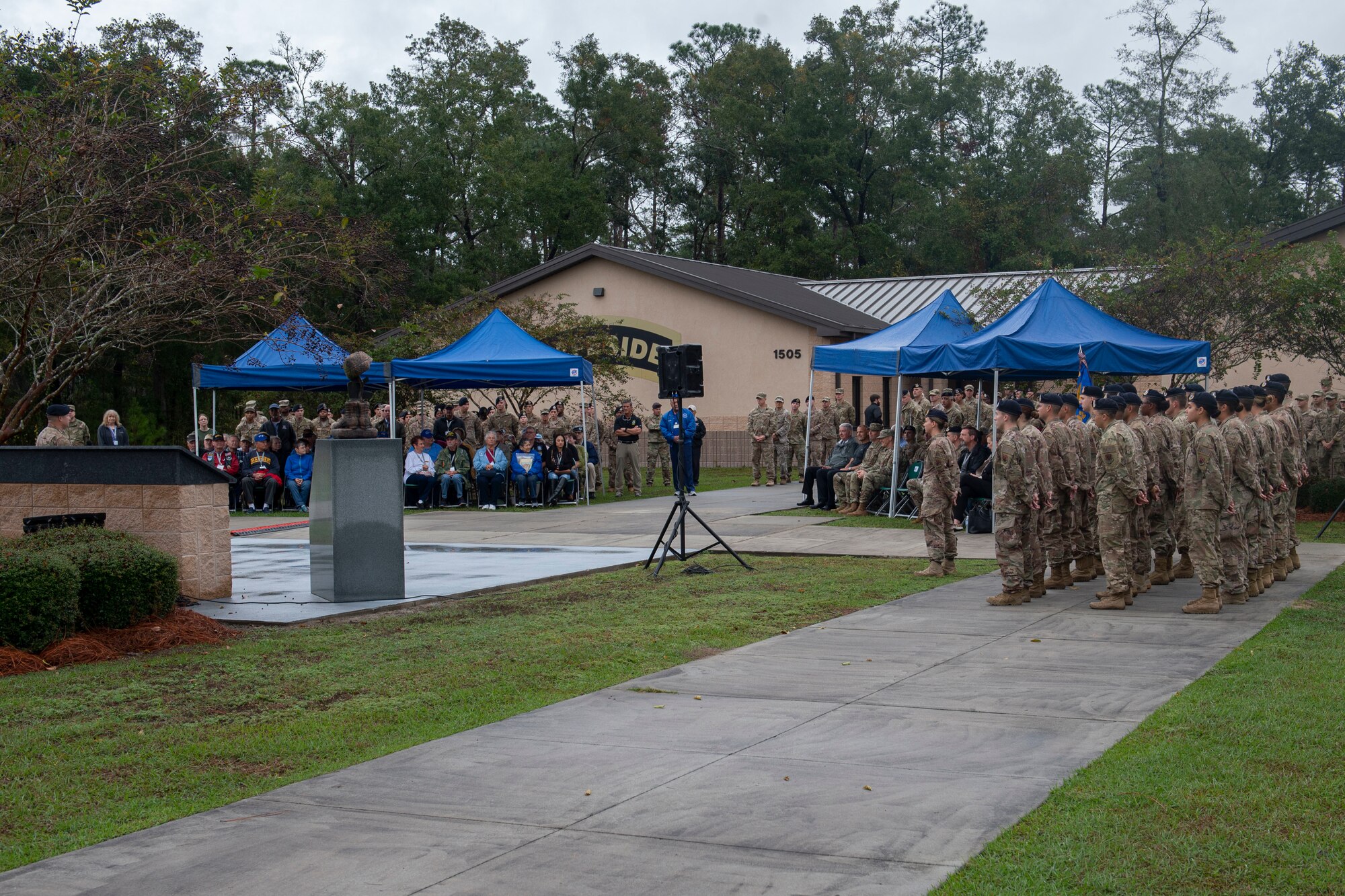 Airmen assigned to the 820th Base Defense Group (BDG) and members of the Safeside Association attend a memorial service Nov. 8, 2019, at Moody Air Force Base, Ga. Safeside members come together every two years to participate in a three-day event to expose new 820th BDG Airmen to their heritage. The reunion consists of a memorial service for fallen Safeside members, current capabilities demonstration and golf tournament. (U.S. Air Force photo by Airman Azaria E. Foster)