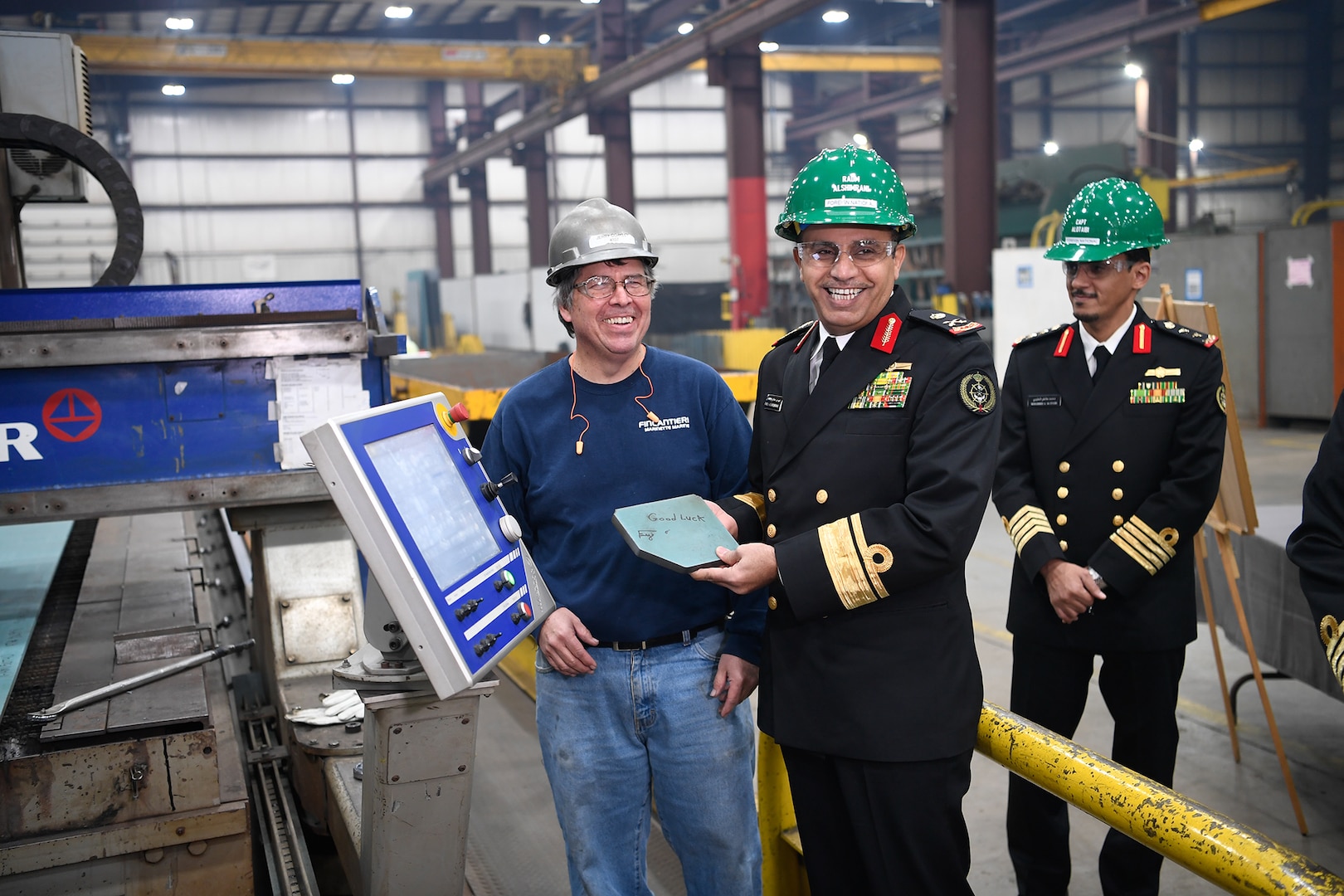 Royal Saudi Naval Forces Eastern Fleet Commander Admiral Fahad Al-Shimrami at the Cut Steel event with the first material for MMSC 1, the eventual HMS Saud.