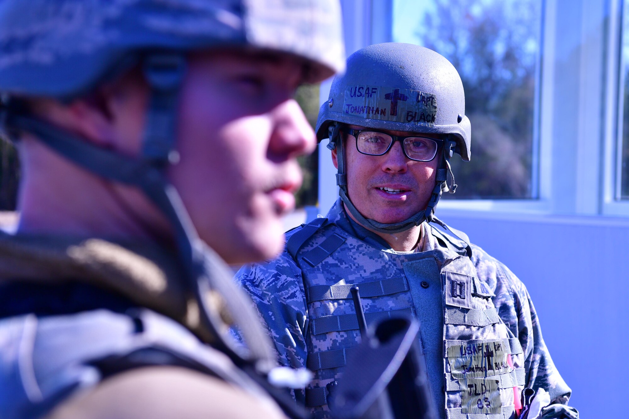 Airmen shake hands