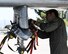 An Airman assigned to the 355th Wing works on an A-10 Thunderbolt II during Exercise Bushwhacker 19-08 at Libby Army Airfield, Arizona, Nov. 4, 2019. This exercise is helping Airmen learn to approach all problems with a multi-functional mindset focused on mission success. (U.S. Air Force photo by 2nd Lt. Casey E. Bell)