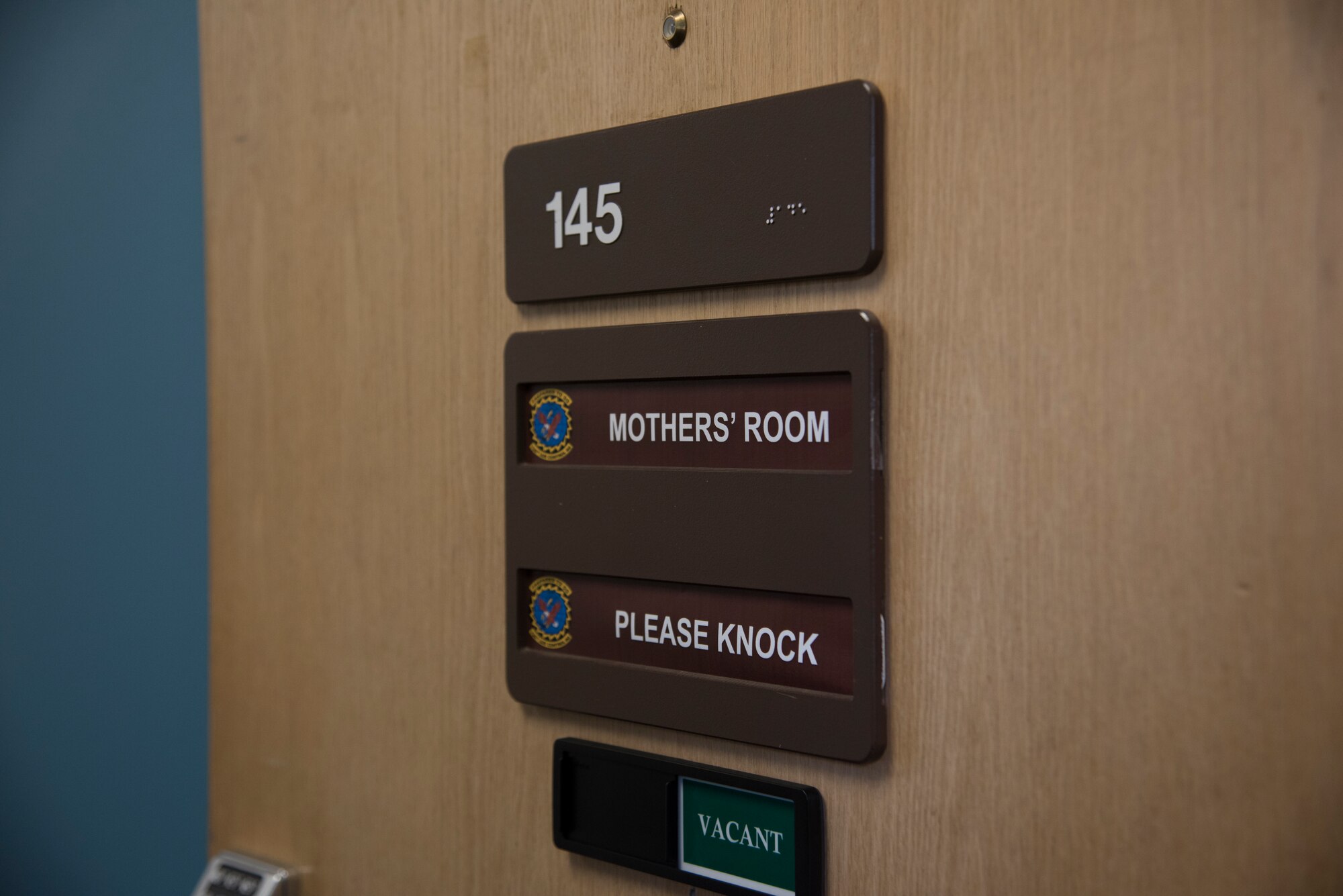 The 726th Air Control Squadron mothers' room door is left open for ACS moms, Sept. 09, 2019, Mountain Home Air Force Base, Idaho. The addition of the "please knock" and "vacant" sign were added to give the mothers more privacy. (U.S. Air Force photo by Airman 1st Class Nicholas Swift)